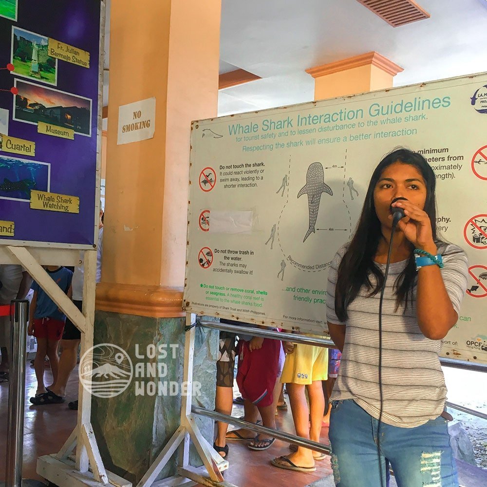 Photo of a girl giving orientation prior to Whale Shark Watching in Oslob Cebu