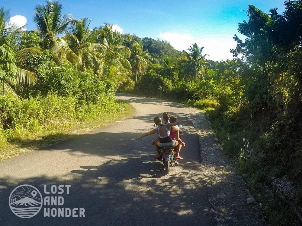 Photo of travelers riding a habal-habal going to Tumalog Falls in Oslob Cebu