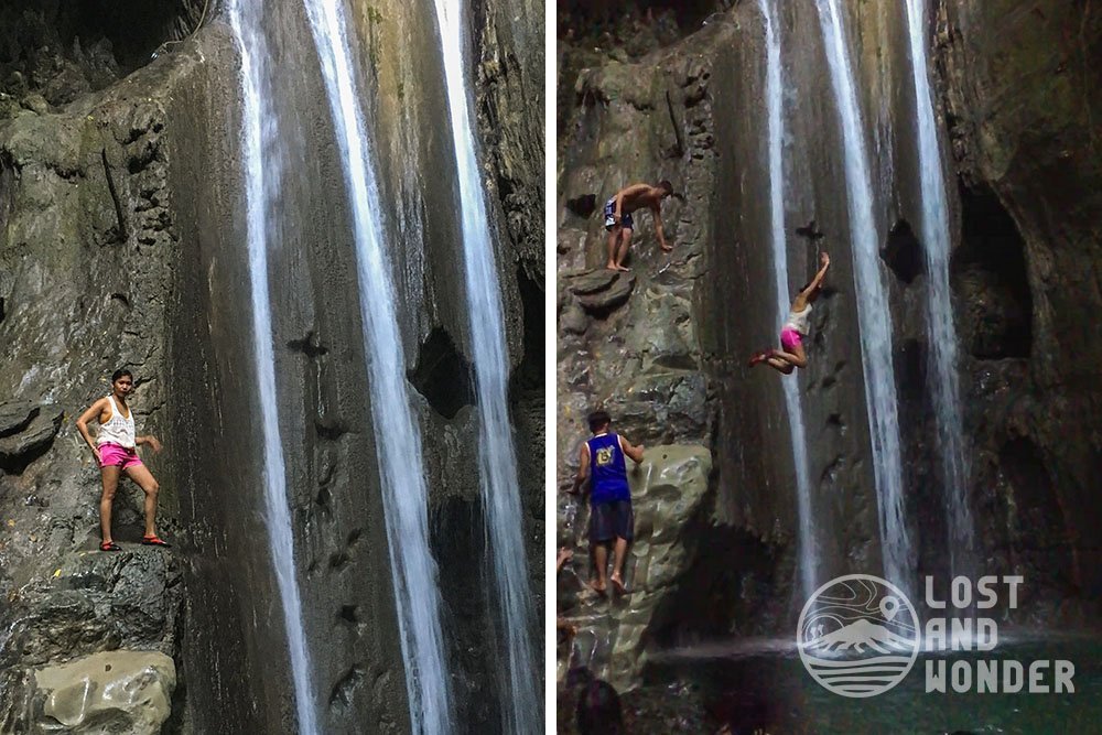 Photo of a woman cliff jumping a waterfall