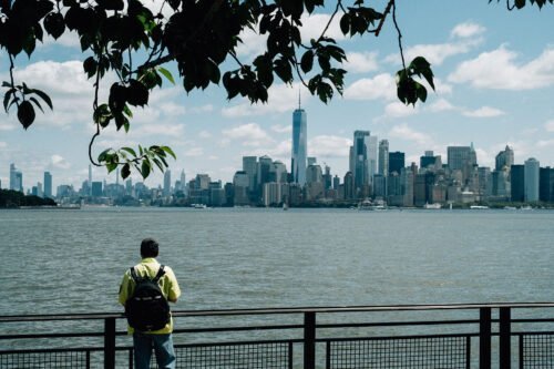 Photo of a traveler viewing Lower Manhattan in New York