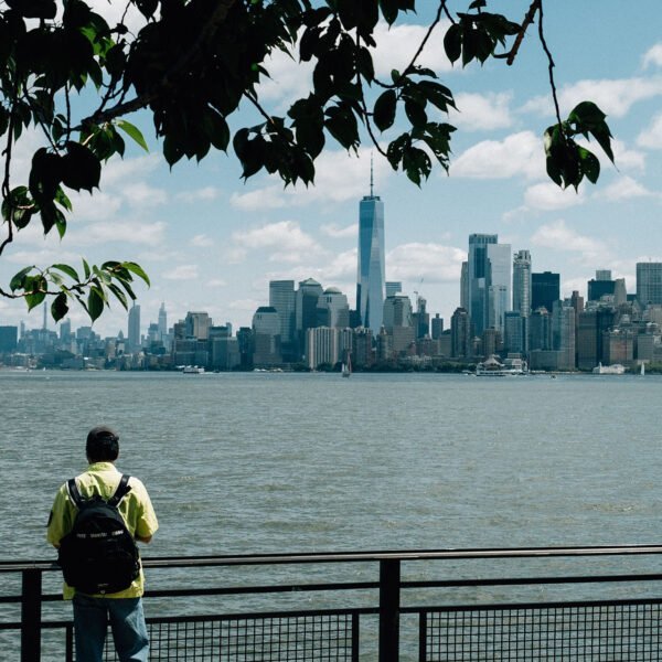 Photo of a traveler viewing Lower Manhattan in New York